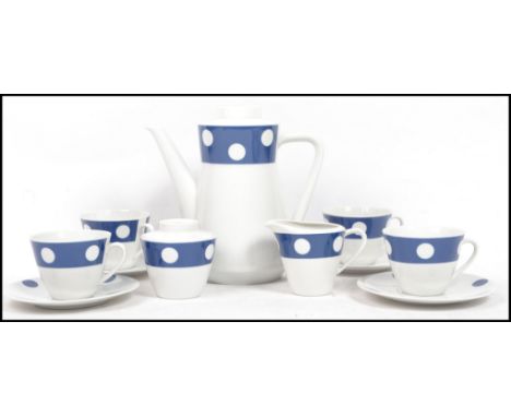 A retro 20th century ceramic polka dot coffee set, consisting of cups, coffee pot etc. Measurements: 21 cm highest, 10 cm wid