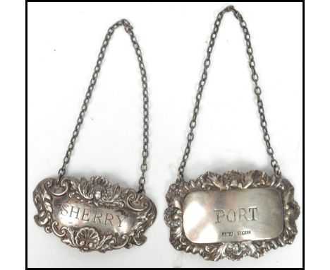 Silver hallmarked drinks bottle  labels. One label for port with Birmingham assay mark, makers mark for J M-A and dating to 1