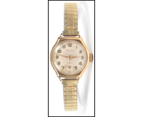A vintage 20th century ladies 9ct gold Rotary wrist watch, on a gold plated bracelet.