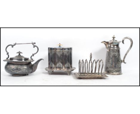 A collection of early 20th century silver plated items to include a tea caddy with hinged lid and surmounted with an ivory kn