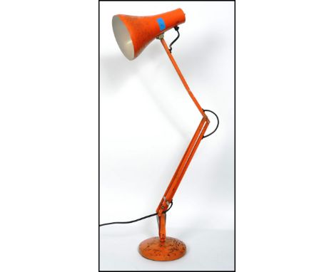 A vintage 20th century 1940's Herbert Terry two step orange model 90 anglepoise Industrial desk lamp having square terraced b