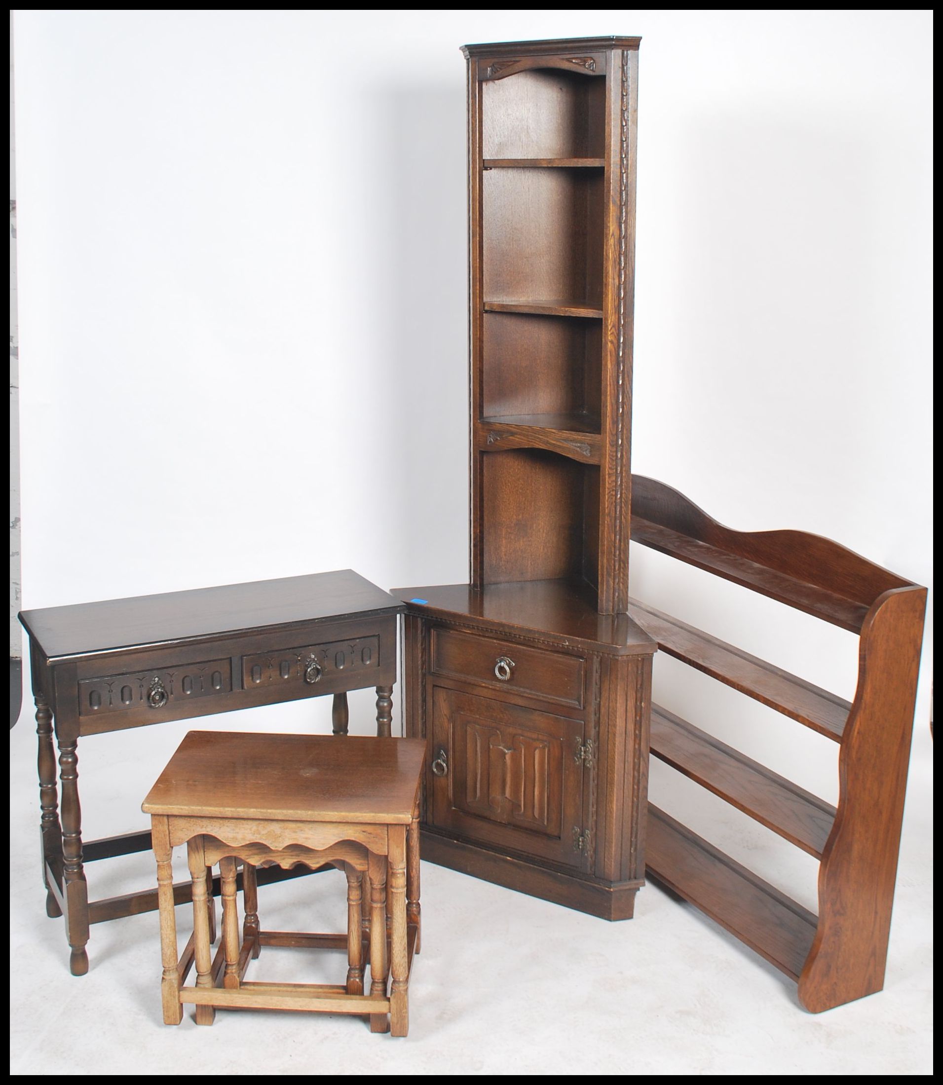 A collection of 20th century reproduction oak furniture by Jaycee, to