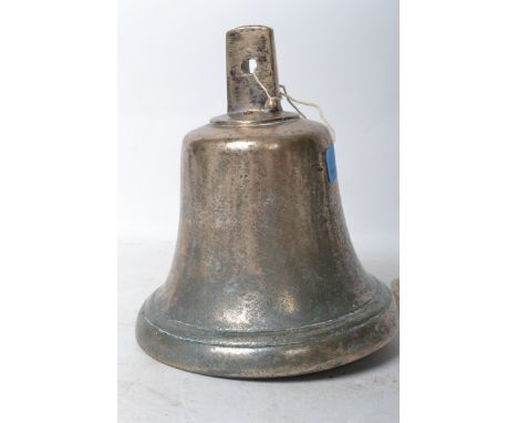 A large 20th century cast iron / bronze ships bell having a bail to top and clapper on rope to interior, painted in a chrome 