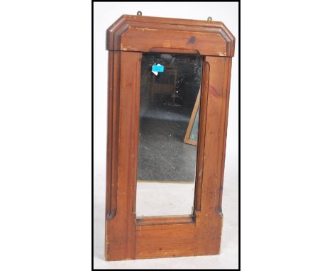A fantastic up-cycled wall mirror being constructed from 19th century pew ends framing a central mirror panel, please refer t