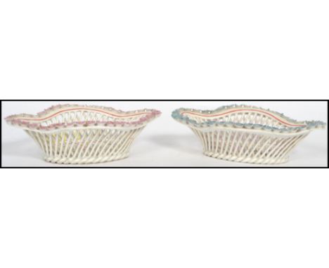 A pair of 19th century ceramic ribbon pin dishes, having hand painted floral panels to the centre possibly by Chelsea. Measur