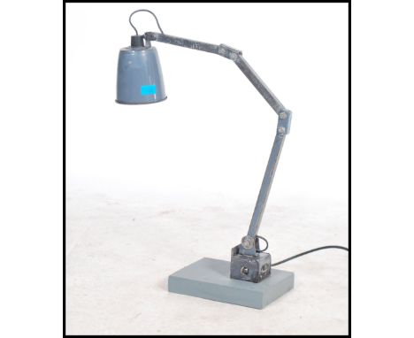 A vintage 20th century Industrial Memlite anglepoise desk - wall mounted work lamp in original grey paint with square arms an