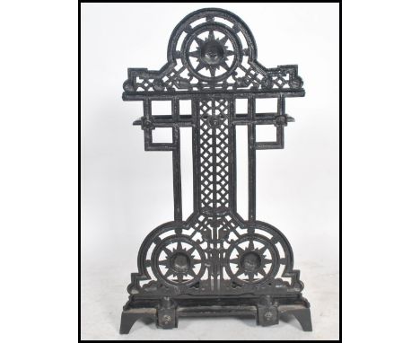 A Victorian 19th century aesthetic movement cast iron two section stick stand in the manner of Coalbrookdale. Of large form h