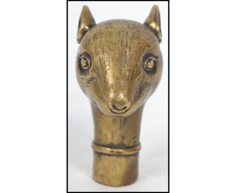 A vintage 20th century brass walking stick cane handle in the form of a rodent. Measurements: 8 cm high, 4 cm wide and 6 cm d