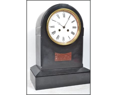 A Good Victorian large Slate mantel clock of spire shape. The large ceramic white dial with notation for Slocombe. The brass 