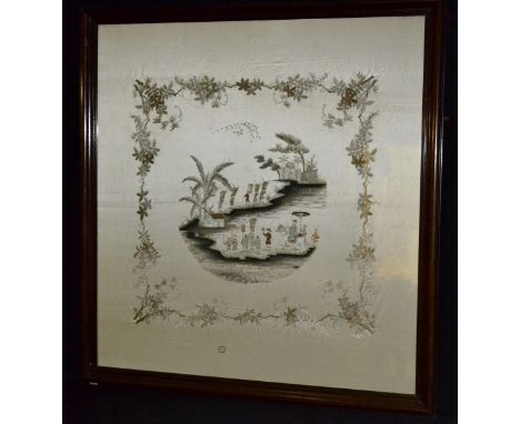 A large Chinese silk panel, embroidered with parade going up a hill, within foliage and scrolls, 90cm x 85cm, framed