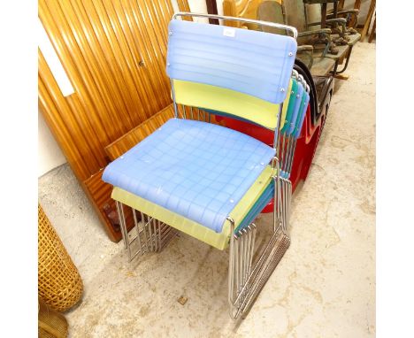 7 modern stacking chairs on chrome sled bases 