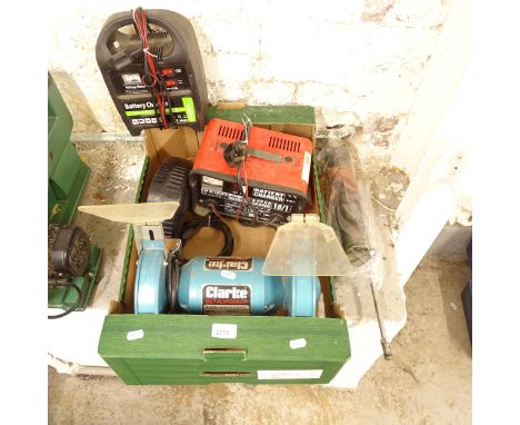 A box containing a bench grinder, jack, 2 car battery chargers etc 