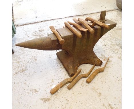 A cast-iron anvil, L62cm, H27cm, and 9 various smithing tools