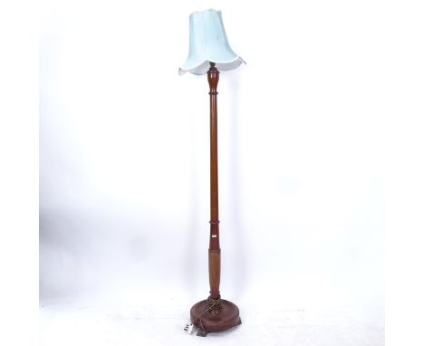 A mahogany standard lamp with shade, overall 180cm 