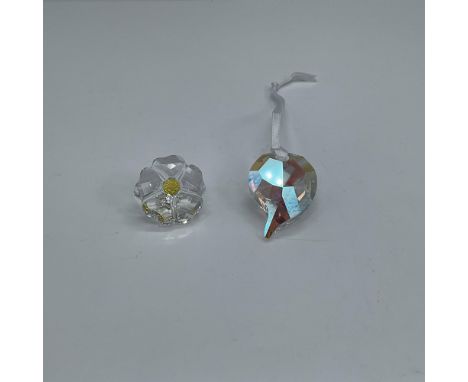 Two beautiful crystal miniatures. One is a wildflower with a yellow pistil, the other a teardrop shaped pendant. The wildflow