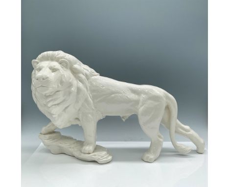 Glazed finish. Features an undecorated white Lion standing glorious on a rock. Goebel backstamp. Issued: 20th centuryDimensio