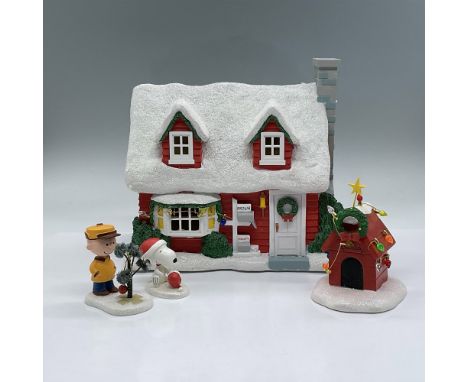 This adorable set comes with Charlie Brown's House in resin with a light cord. Included with the house are Charlie Brown with