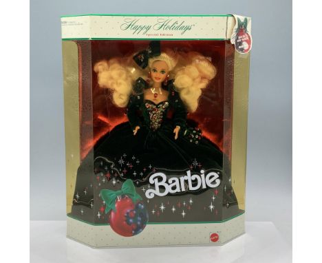 Dressed in a green velvet gown and bow, adorned with red, green, and silver sequins and beads, accessorized with red crystal 
