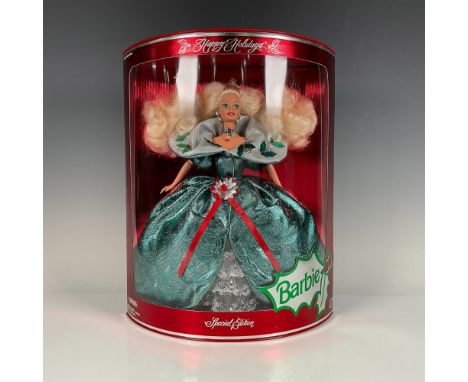New in Box fabulous Barbie in her green and silver glitter dress. This item has its original box. Model #14123. SKU: 07429914