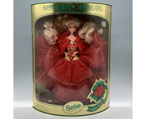 Dressed in a red lace gold-colored glittery gown, adorned with poinsettia sequins and beads. First in the 1993 Holiday Barbie