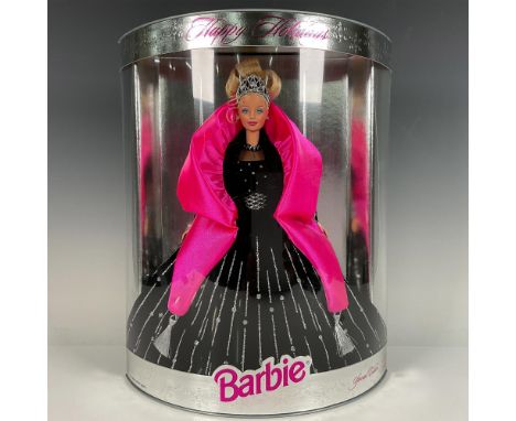 New in box Barbie doll in her elegant black velvet dress with glitter details and fuchsia wrap. Model 20200. This item has it