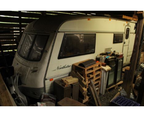A SINGLE AXLE AWARD CARAVAN SHELL FOR RESTORATION PROJECT TO INCLUDE FITTED CUPBOARDS AND A FREE STANDING KITCHEN UNIT WITH B