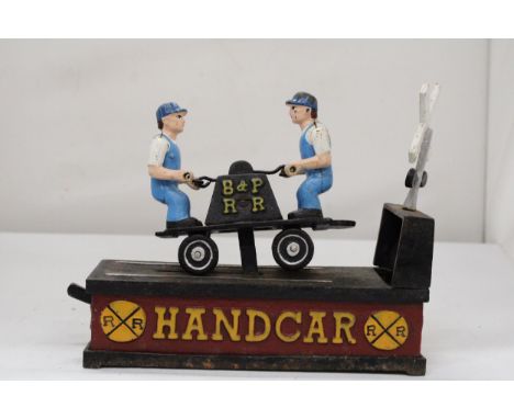 A VINTAGE CAST MECHANICAL RAILROAD COIN BANK 