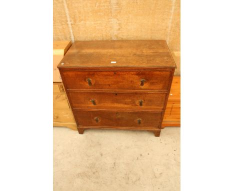 A 19TH CENTURY OAK CHEST OF THREE GRADUATED DRAWERS WITH LATER HANDLES ON BRACKET FEET 36.5" WIDE 