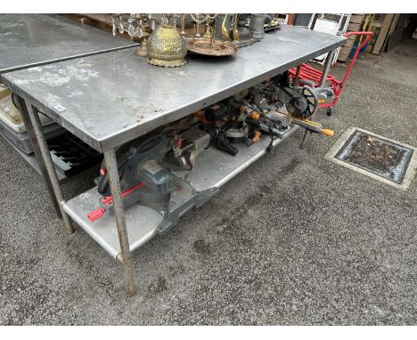 A STAINLESS STEEL KITCHEN WORK BENCH WITH STEEL LEGS AND LOWER SHELF (L:182CM) - JUST THE BENCH 