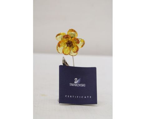 A SWAROVSKI CRYSTAL LIGHT TOPAZ DAMBULLA FLOWER WITH BOX AND CERTIFICATE 