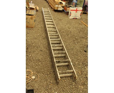A TWO SECTION 32 RUNG 'CLIMA' ALUMINIUM EXTENDING LADDER 