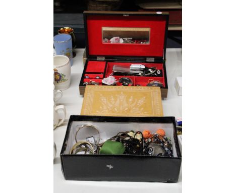 AN ASSORTMENT OF JEWELRY TO INCLUDE RINGS, NECKLACES, BANGLES, A LIGHTER, EARRINGS ETC IN THREE JEWELRY BOXES 