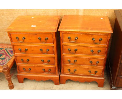 A PAIR OF YEW WOOD AND CROSSBANDED SMALL CHESTS OF FOUR DRAWERS ON BRACKET FEET 17.5" WIDE 