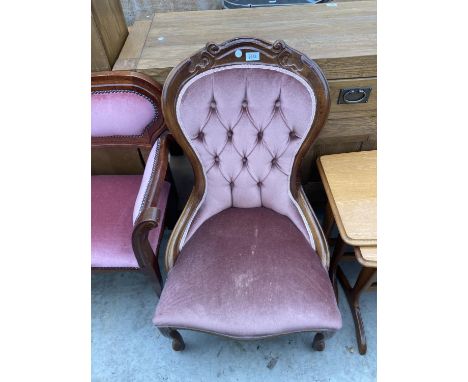 A SPOON BACK LOUNGE CHAIR 