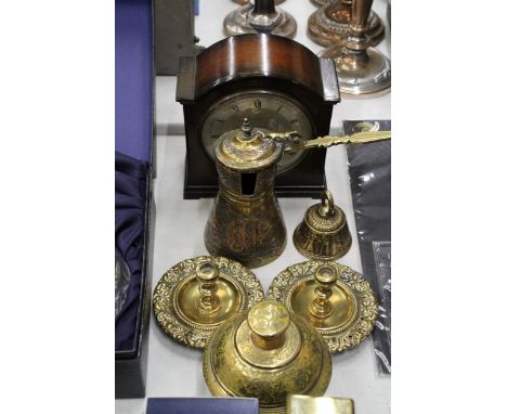 A MAHOGANY CASED BATTERY OPERATED MANTLE CLOCK, A LARGE HEAVY TEMPLE BELL, PAIR OF BRASS CANDLESTICKS, ETC 