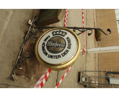 A LARGE DOUBLE SIDED WARFTEINER PUB SIGN WITH DECORATIVE WROUGHT IRON WALL HANGING BRACKET 