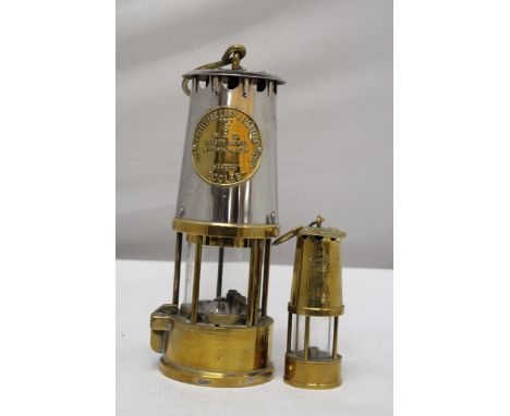 A PROTECTOR LAMP AND LIGHTING 6 M &amp; Q SAFETY LAMP - MAKERS ECCLES TOGETHER WITH A SMALLER PROTECTOR LAMP CO. LTD ECCLES 