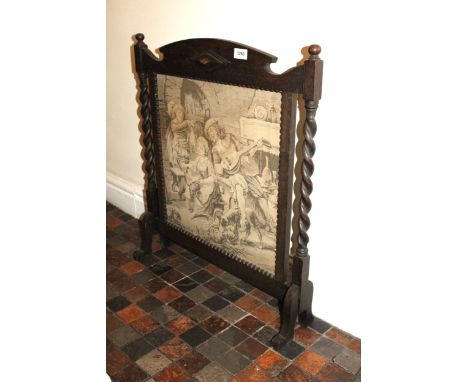 A VINTAGE OAK TAPESTRY FIRE SCREEN 