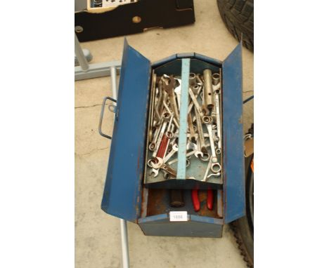 A METAL TOOL BOX WITH AN ASSORTMENT OF TOOLS TO INCLUDE SPANNERS ETC 