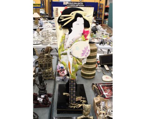 A VINTAGE JAPANESE HAGOITA GEISHA DOLL WITH A SILK PADDLE ON A WOODEN STAND, HEIGHT 75CM 