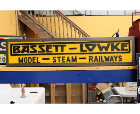 A BASSETT-LOWKE MODEL-STEAM-RAILWAYS DOUBLE SIDED ILLUMINATED SIGN COMPLETE WITH HANGING BRACKET 