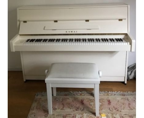 Kawai (c2012)A Model K-15E upright piano in a bright white case, together with a matching stool. 