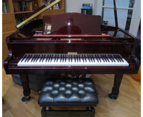 BechendorferA recent 5ft 3in grand piano in a bright mahogany case on square tapered legs; together with an adjustable stool 