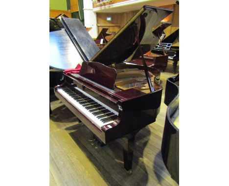 Yamaha (c2009)A 4ft 11in Model GB1 grand piano in a mahogany case on square tapered legs.
