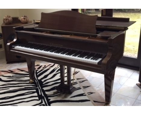 Bechstein (c1988) A 5ft 1in Model K grand piano in a bright mahogany case on square tapered legs.  (Some damage to polyester.