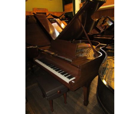 Steinway (c1920)A 5ft 7in New York Model M grand piano in a walnut case on square tapered legs, together with a matching stoo