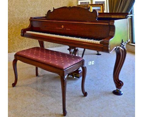 Steinway (c1956)A 5ft 7in New York Model M grand piano in a Louis XV style satin walnut case on carved cabriole legs; togethe