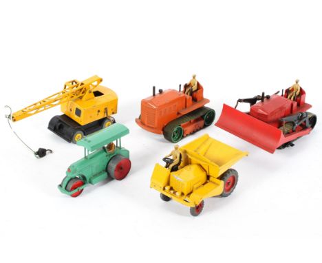 A collection of play worn vintage Dinky Supertoys, including: Blaw Knox Bulldozer (no. 561), a Muir-Hill Dumper Truck (no, 56
