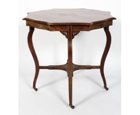 An Edwardian rosewood inlaid occasional table,of shaped octagonal form, inlaid with floral medallion, within stringing, on fo