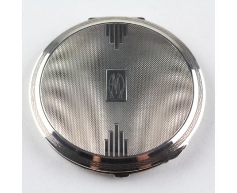 An Art Deco sterling silver compact case, Birmingham 1937, 115 grams